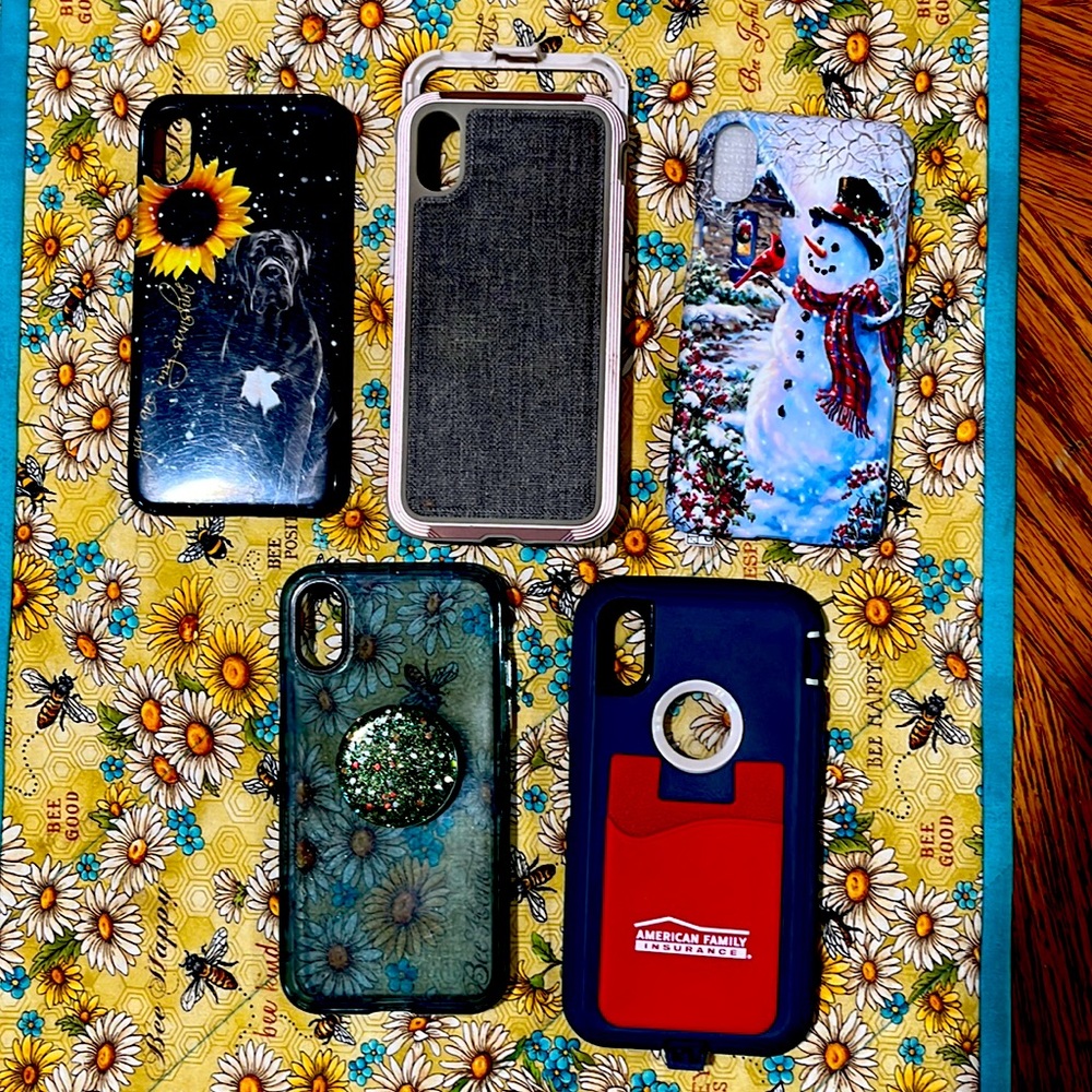 Five Cases and one glass screen protector for an IPhone X.